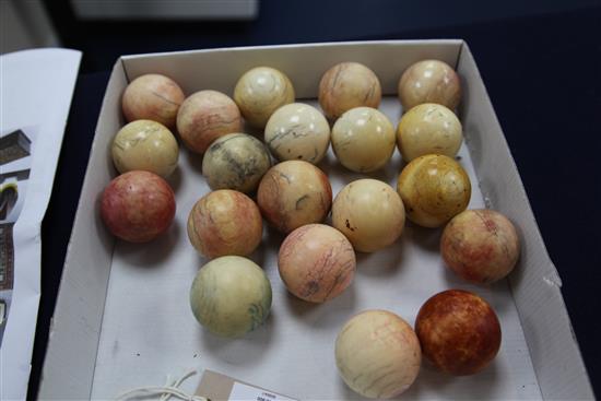 A collection of twenty early 20th century ivory snooker balls, each approx. 2in.